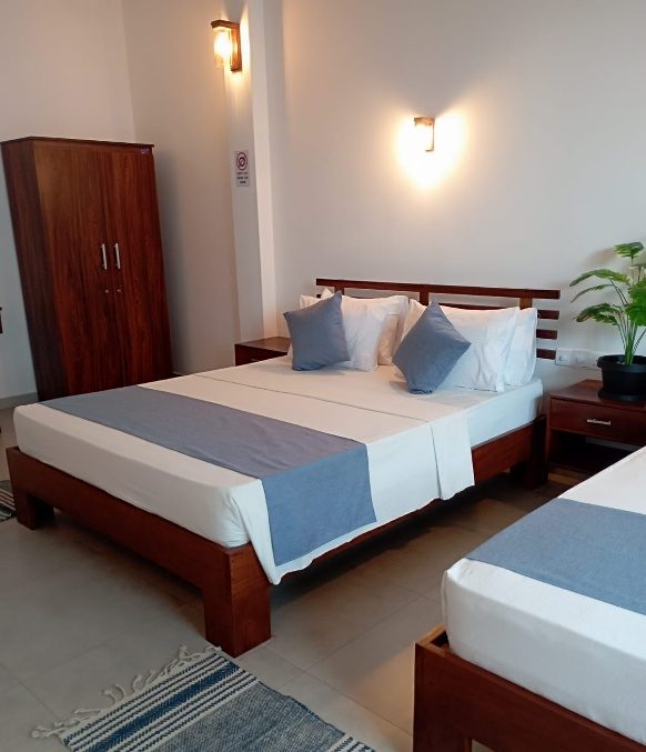 Deluxe triple room with balcony